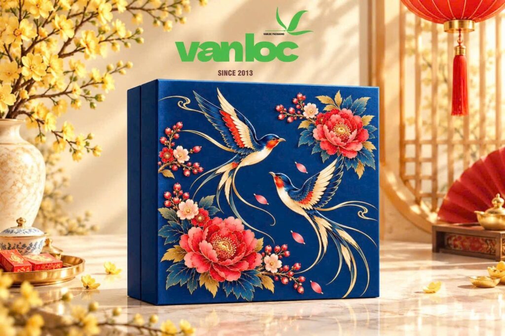 Mẫu hộp quà Tết Vạn Lộc nền xanh, hoạ tiết đôi chim én và hoa mẫu đơn